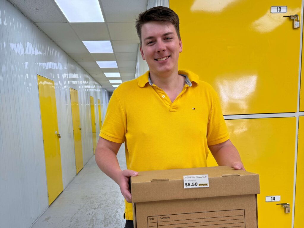 Friendly staff service at the Lower Hutt box shop within the storage facility, assisting with packing supplies.