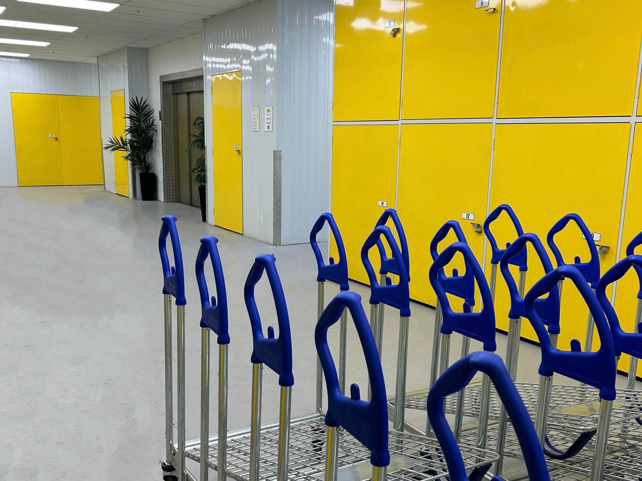 Bright yellow doors marking the entrance to Wellington self storage units, showcasing easy accessibility and secure entry.